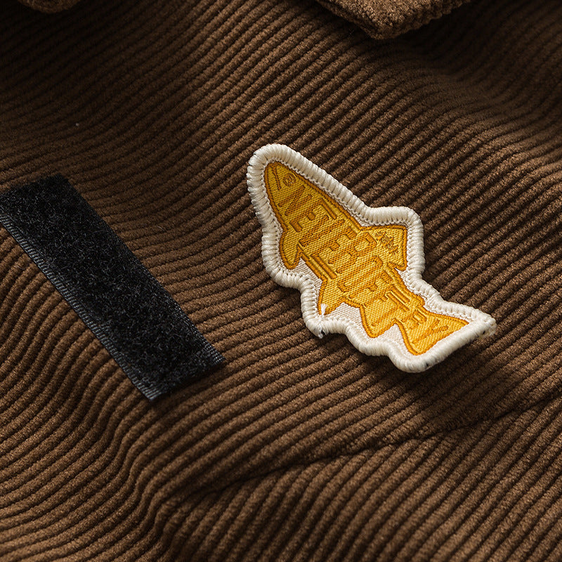 Plain corduroy coat with label decoration