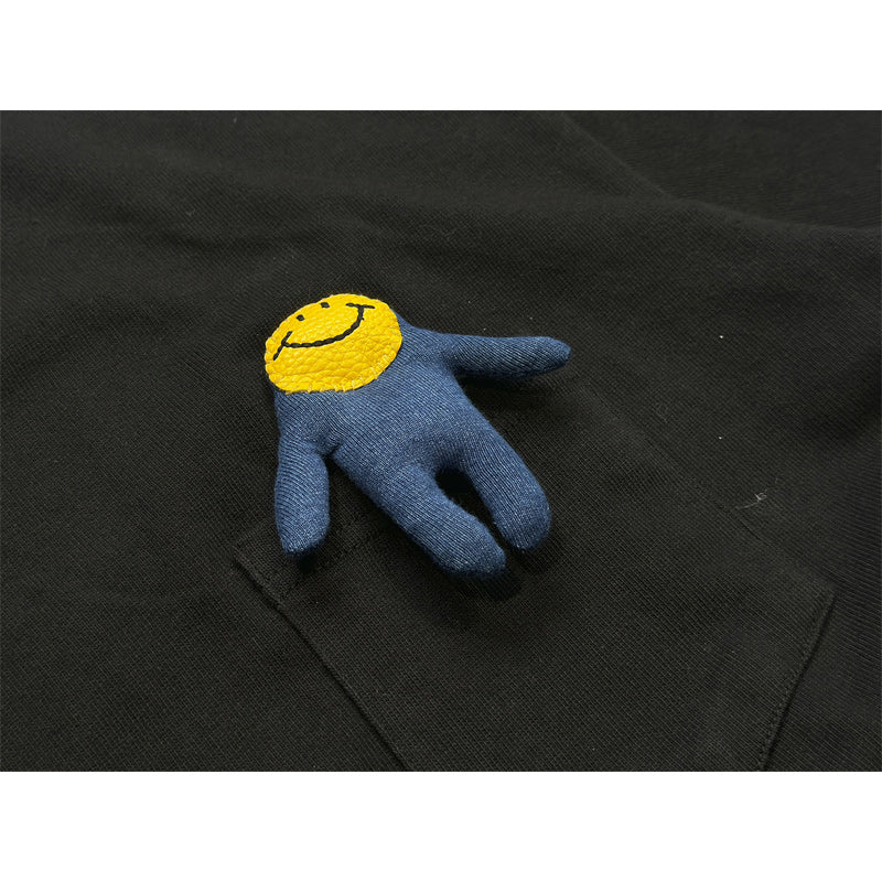 Heavyweight cotton tee with smiley doll keychain