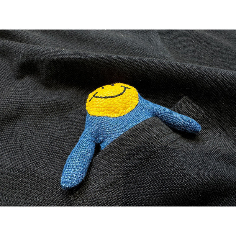 Heavyweight cotton tee with smiley doll keychain