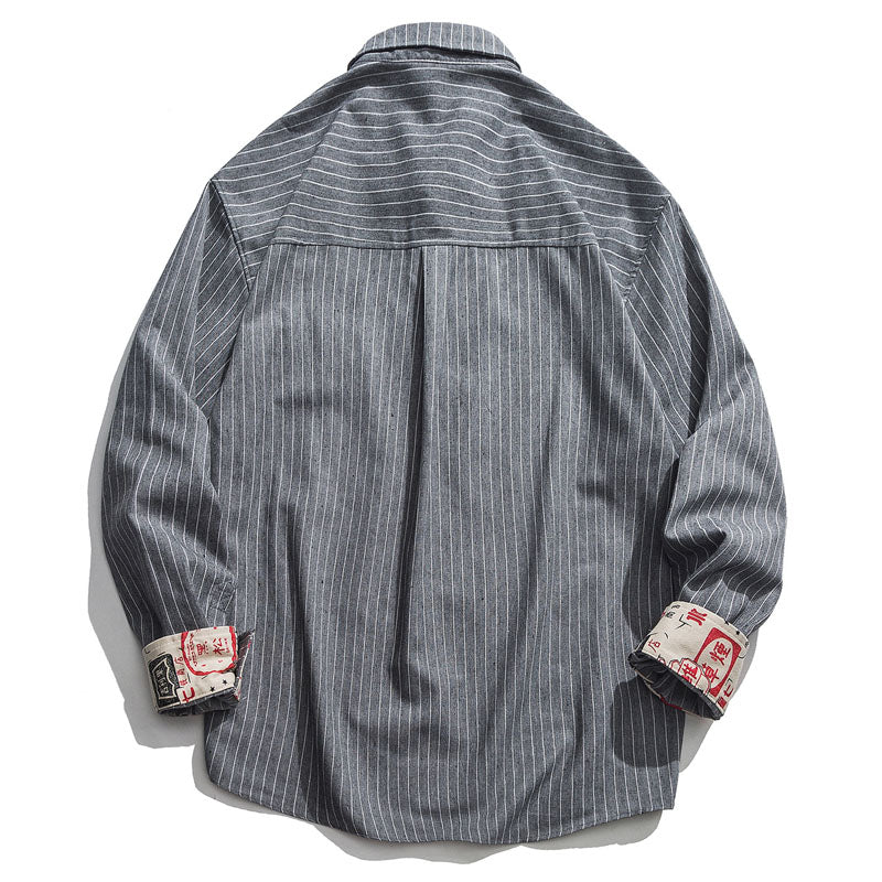 Striped pocket shirt with lettering on sleeves