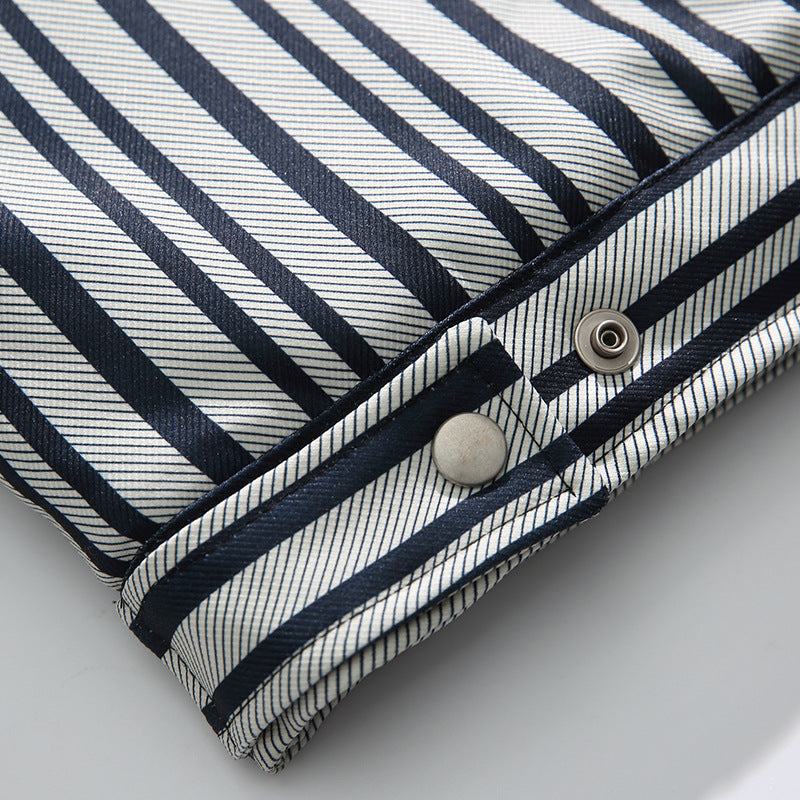Loose-fitting padded jacket with contrasting borders and stripes