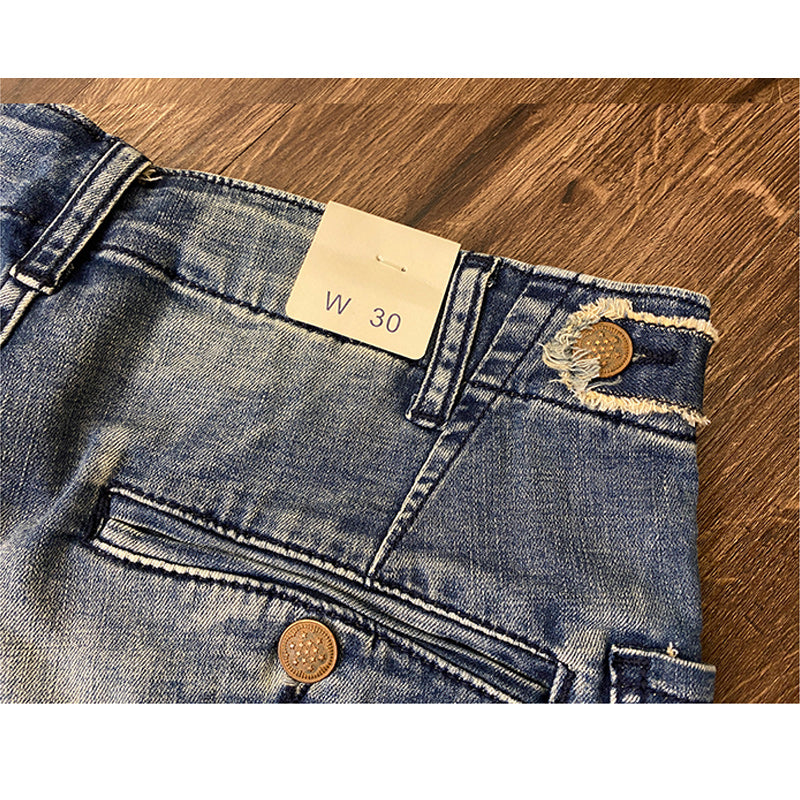 Distressed washed denim shorts