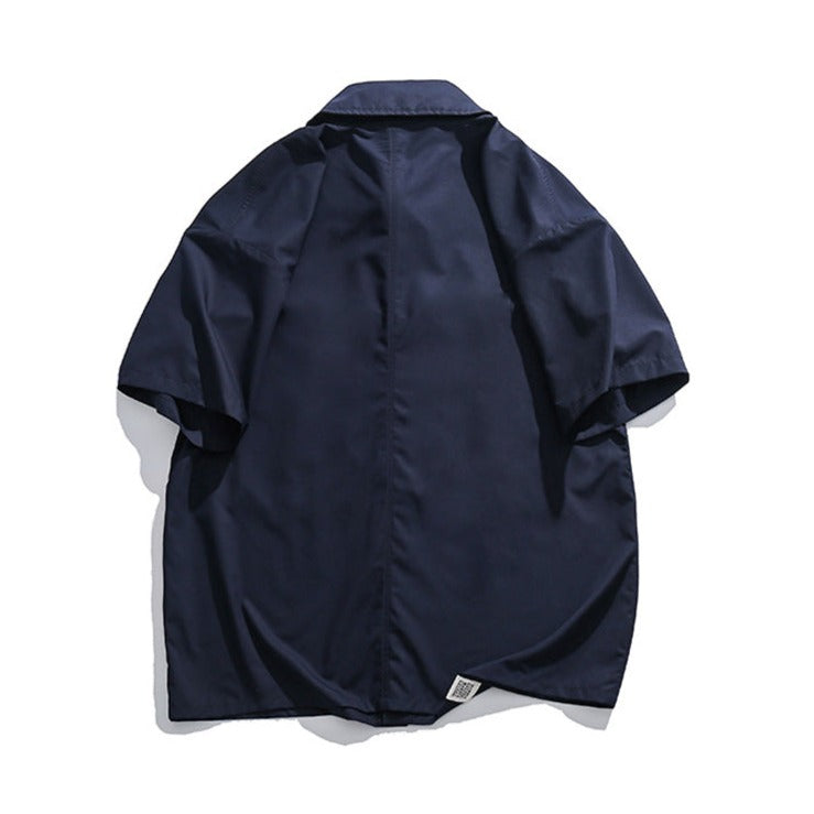 Choose from three colors. Solid color short-sleeved work shirt with pocket.