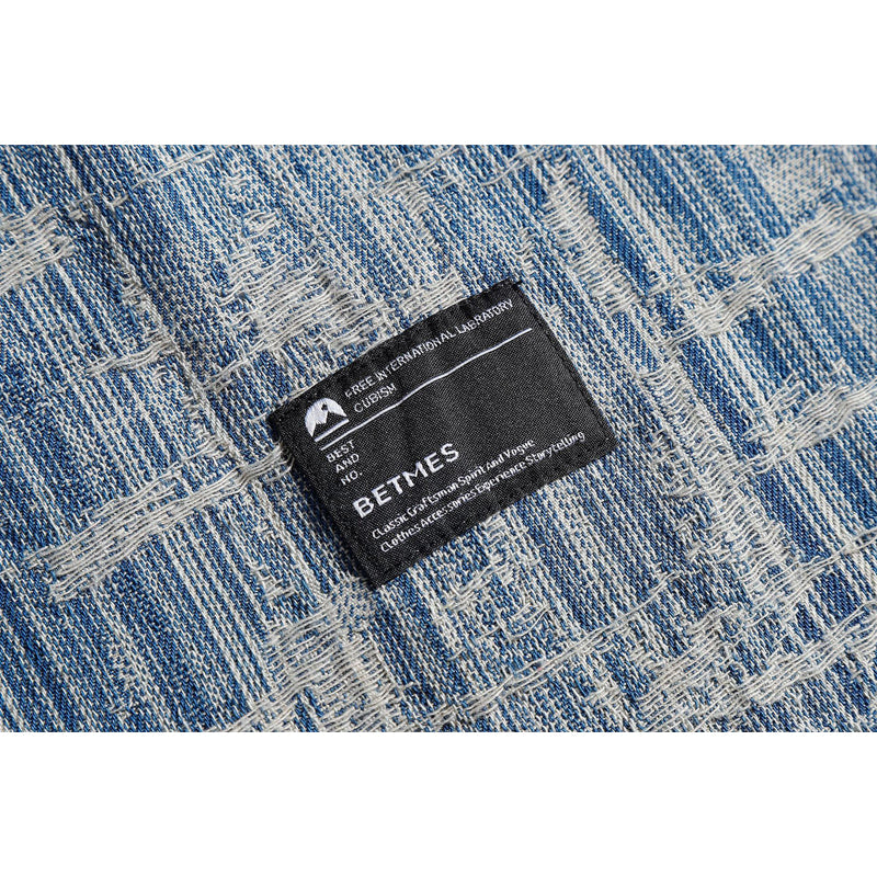 Distressed blue long-sleeved shirt