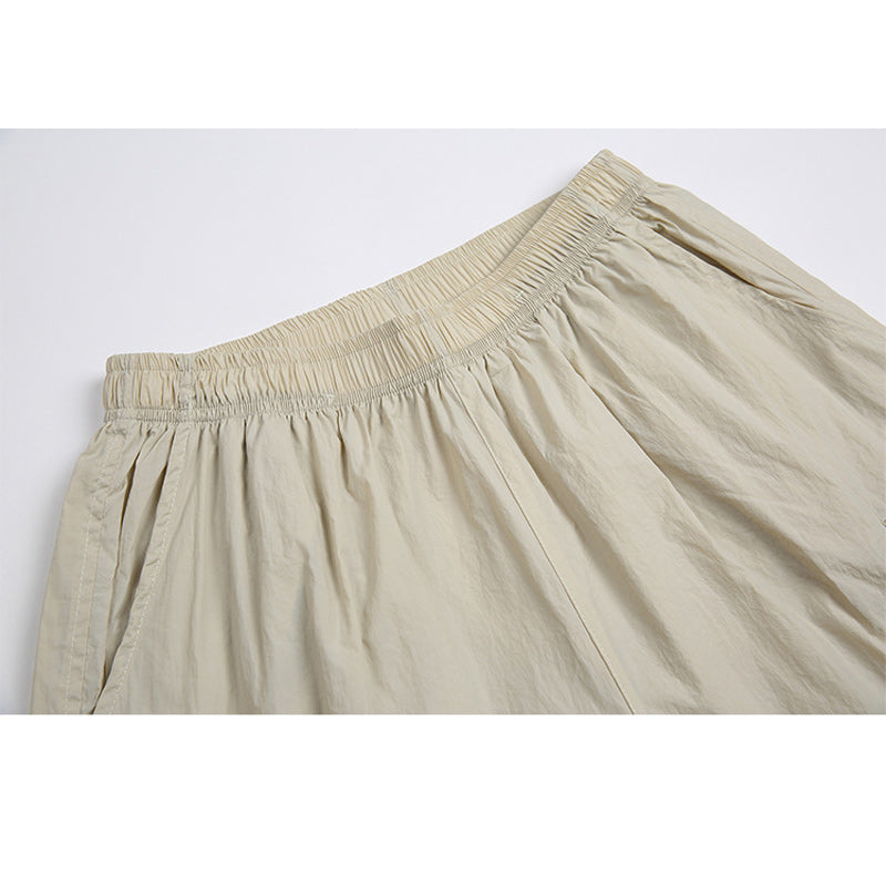 Solid color drawstring pocket track shorts