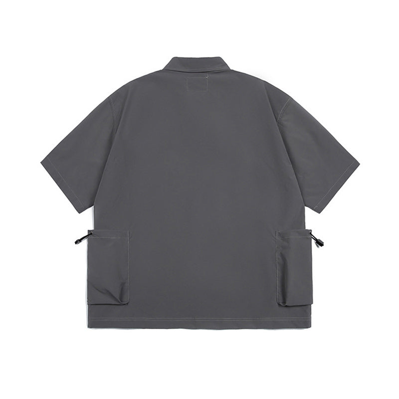 Solid color short sleeve shirt with pockets on both sides