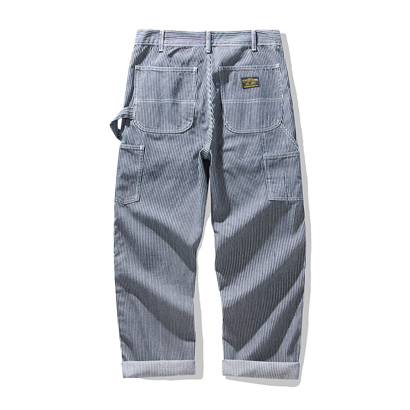 Multi-pocket work pants available in two styles: raw denim and striped denim