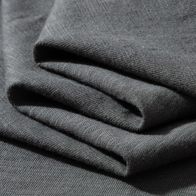 Available in various colors, this slub fabric henley raglan T-shirt