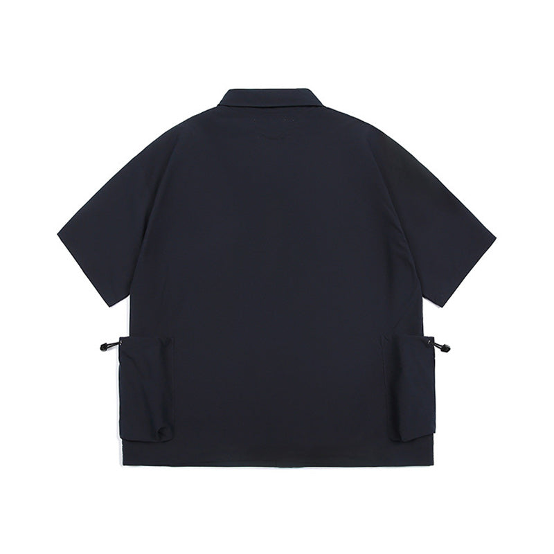 Solid color short sleeve shirt with pockets on both sides