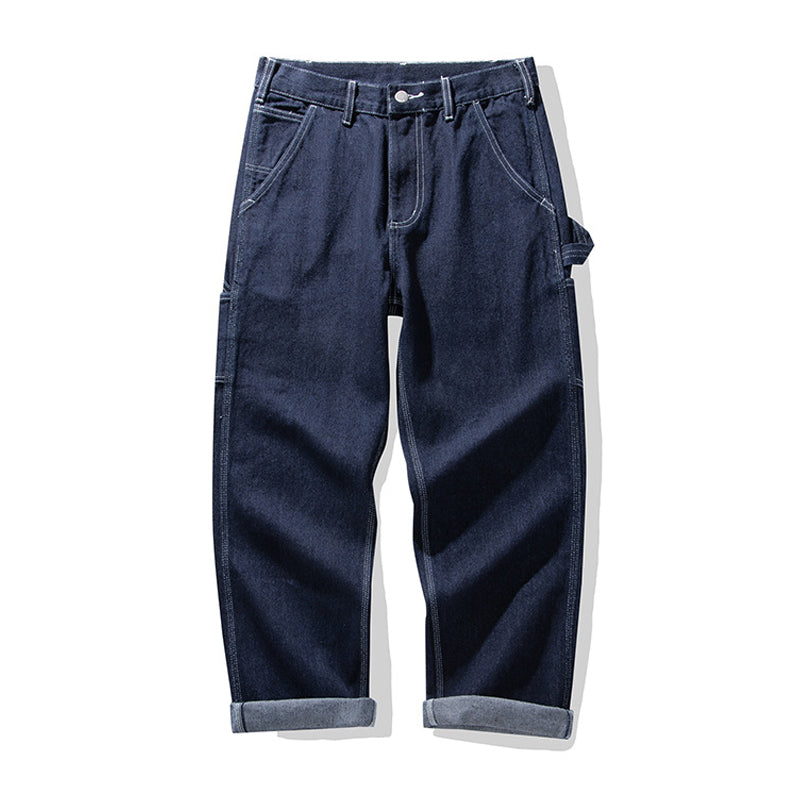 Multi-pocket work pants available in two styles: raw denim and striped denim