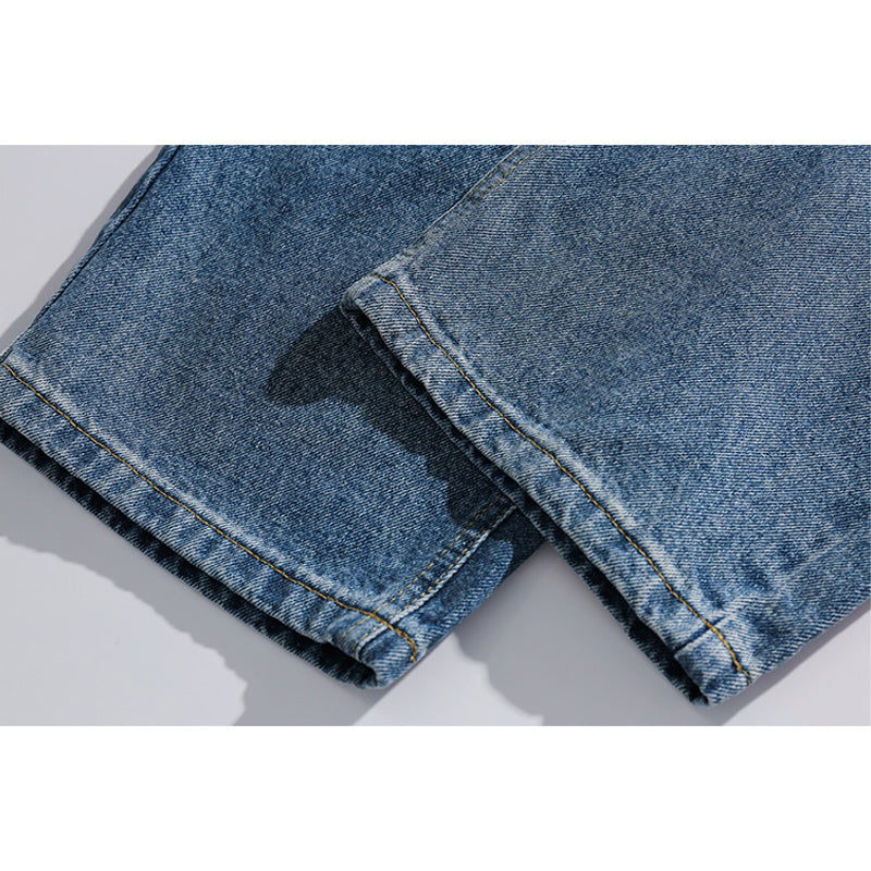 Distressed straight denim pants