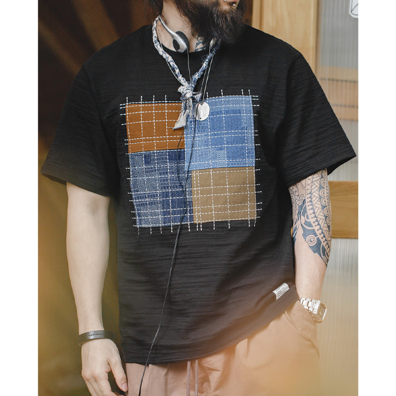 Irregular patchwork cotton tee with sashiko stitching