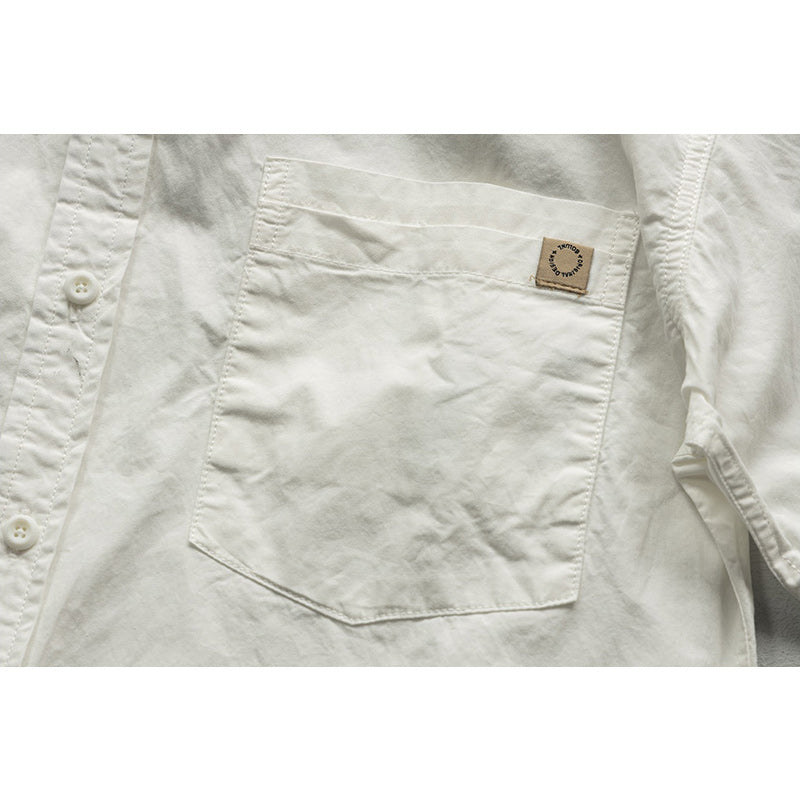 Available in four colors. Solid color short-sleeved work shirt with mountain pocket.