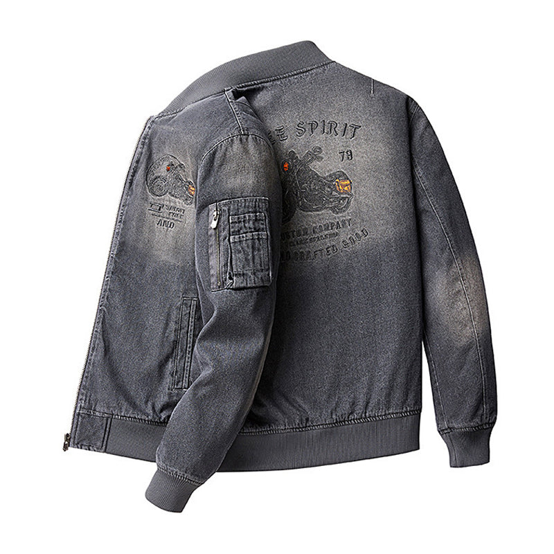 Distressed denim flight jacket with a maple leaf pattern on the back and motorcycle embroidery