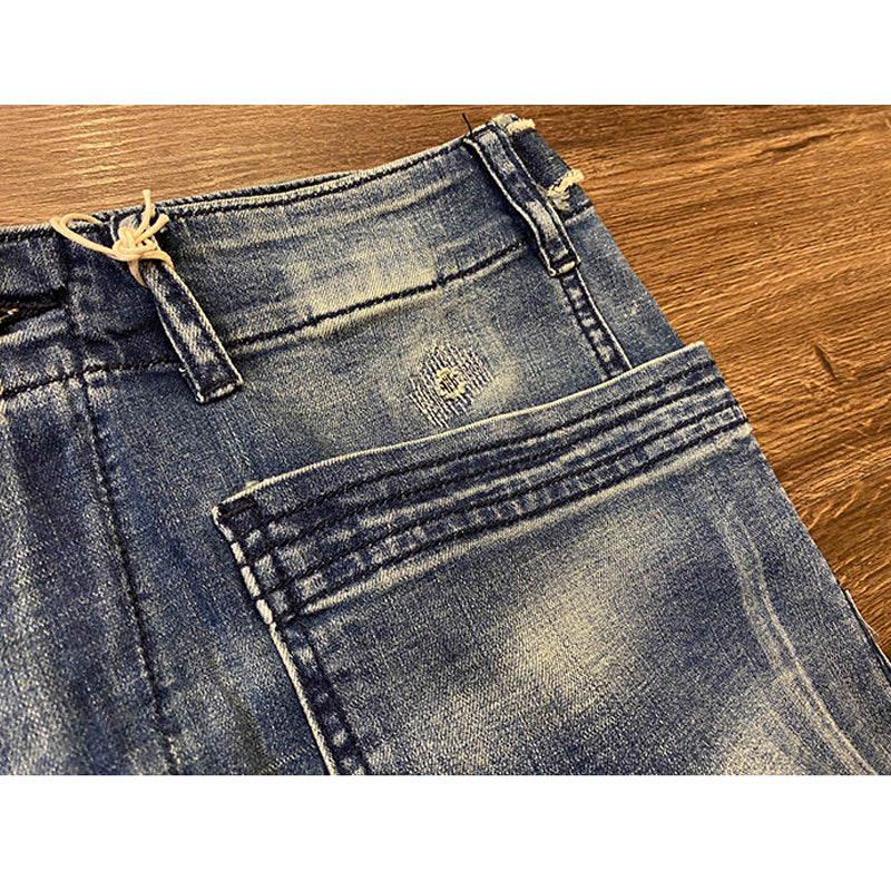 Distressed washed denim shorts