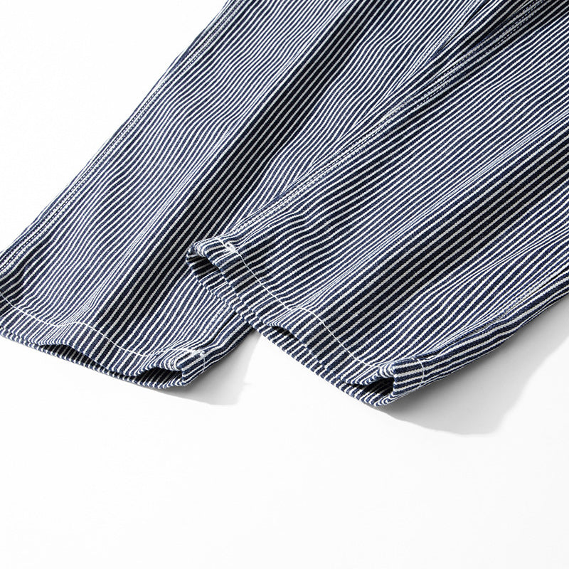Multi-pocket work pants available in two styles: raw denim and striped denim
