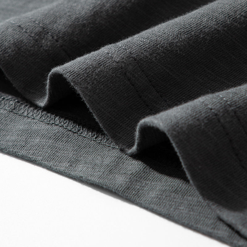 Available in various colors, this slub fabric henley raglan T-shirt