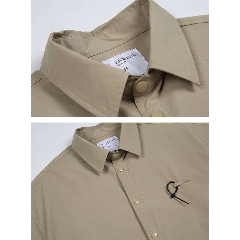 Solid color short sleeve shirt with pockets on both sides