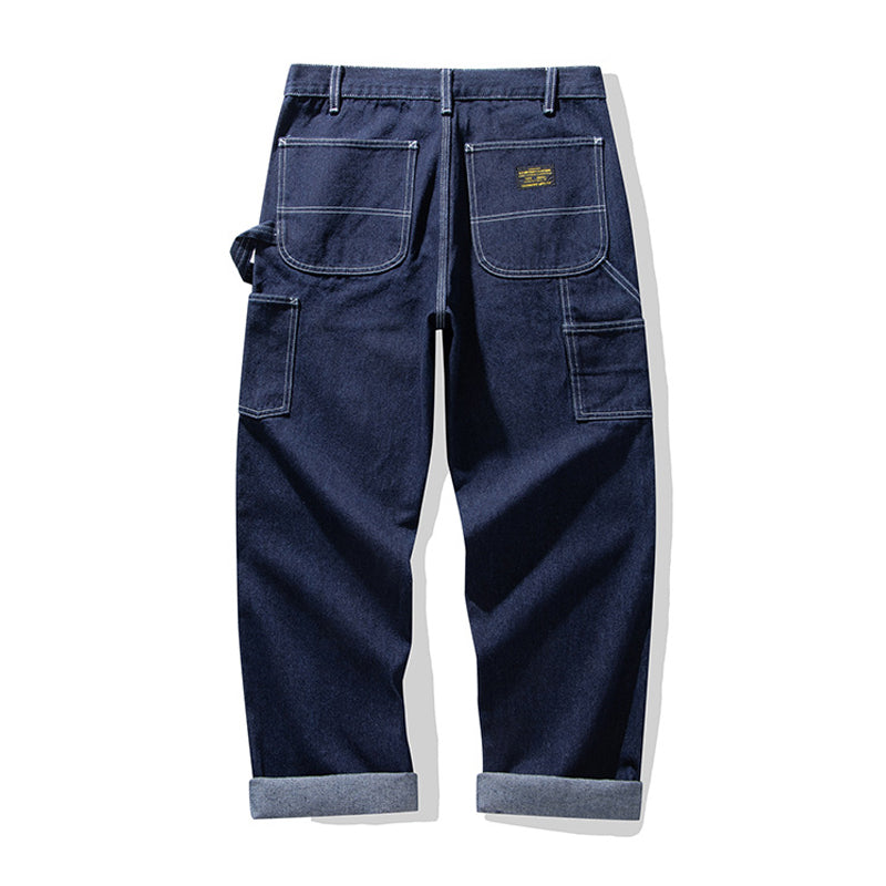 Multi-pocket work pants available in two styles: raw denim and striped denim