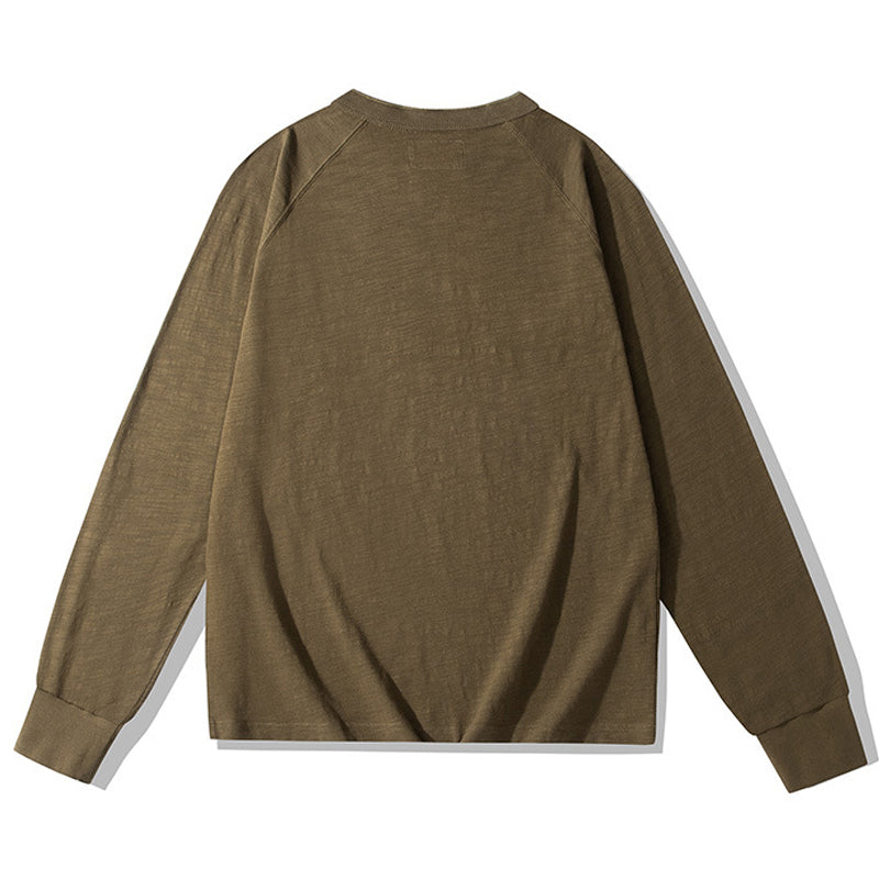 Available in various colors, this slub fabric henley raglan T-shirt