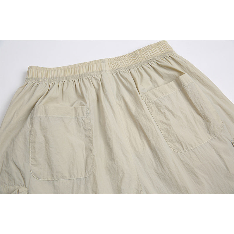 Solid color drawstring pocket track shorts