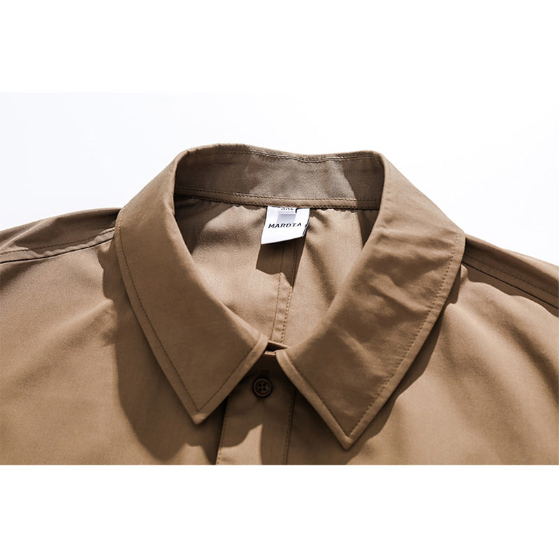 Choose from three colors. Solid color short-sleeved work shirt with pocket.