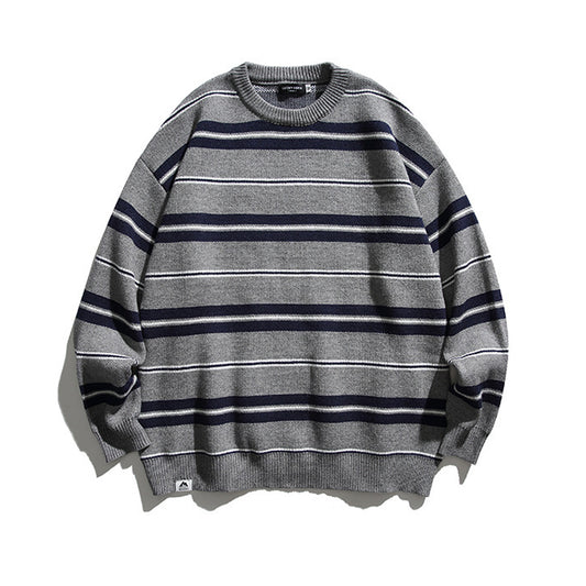 Long-sleeved pullover knit sweater with striped accents and a round neck