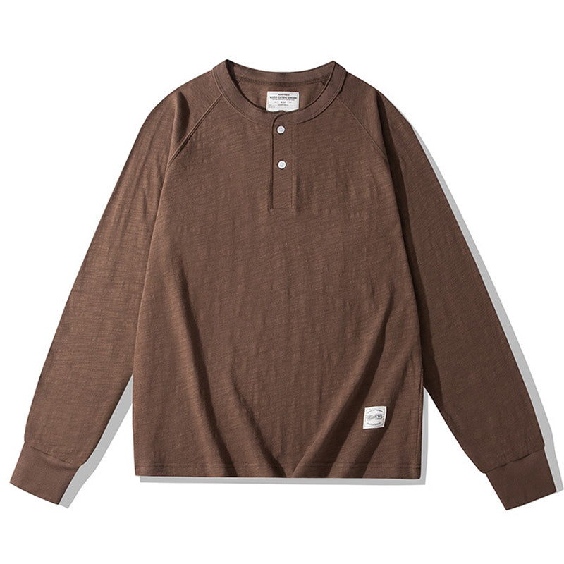 Available in various colors, this slub fabric henley raglan T-shirt