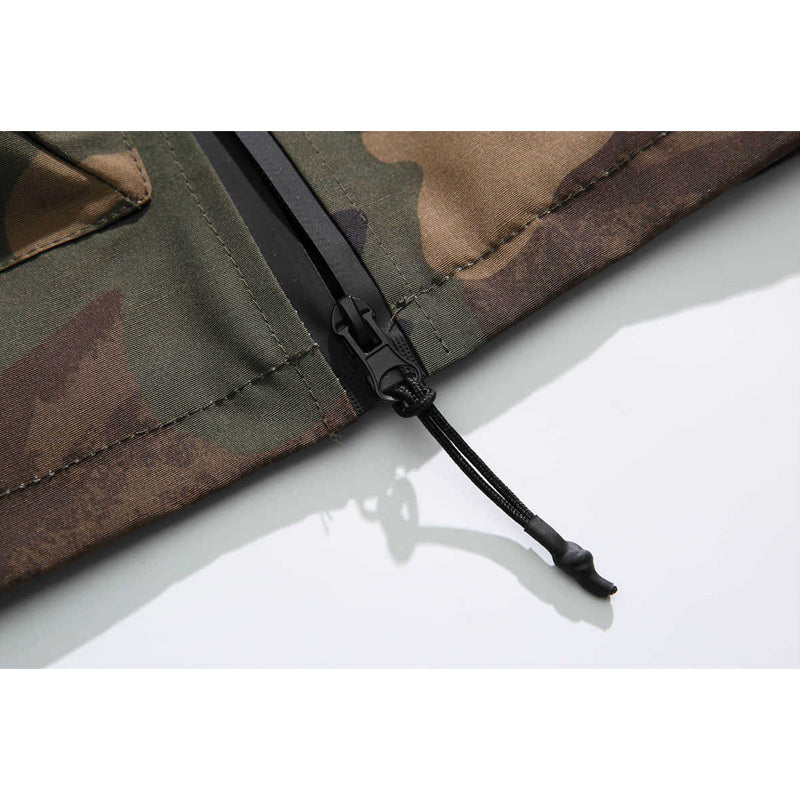 Camouflage high-neck functional vest and plain sweatshirt ensemble