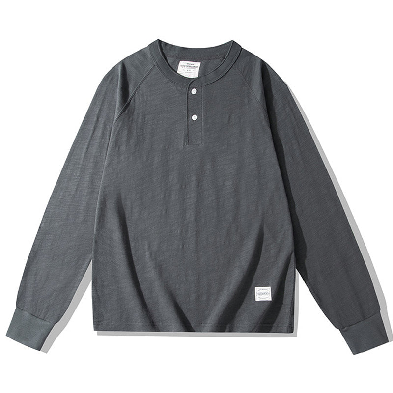Available in various colors, this slub fabric henley raglan T-shirt