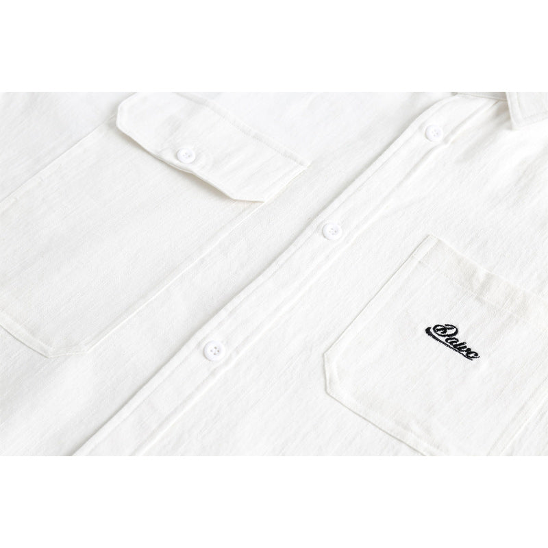White embroidered pocket plain work short sleeve shirt
