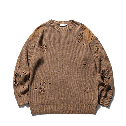 Solid color round neck knit sweater with perforated design