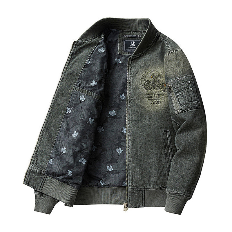 Distressed denim flight jacket with a maple leaf pattern on the back and motorcycle embroidery