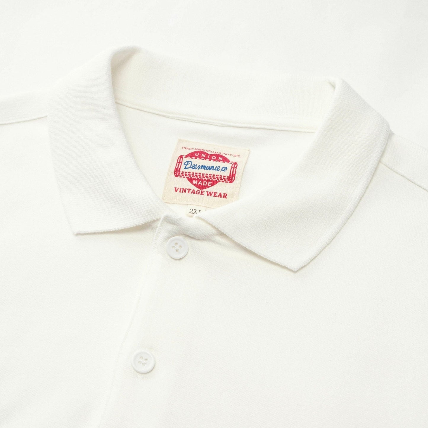 "Man playing guitar" mini embroidered pique polo shirt