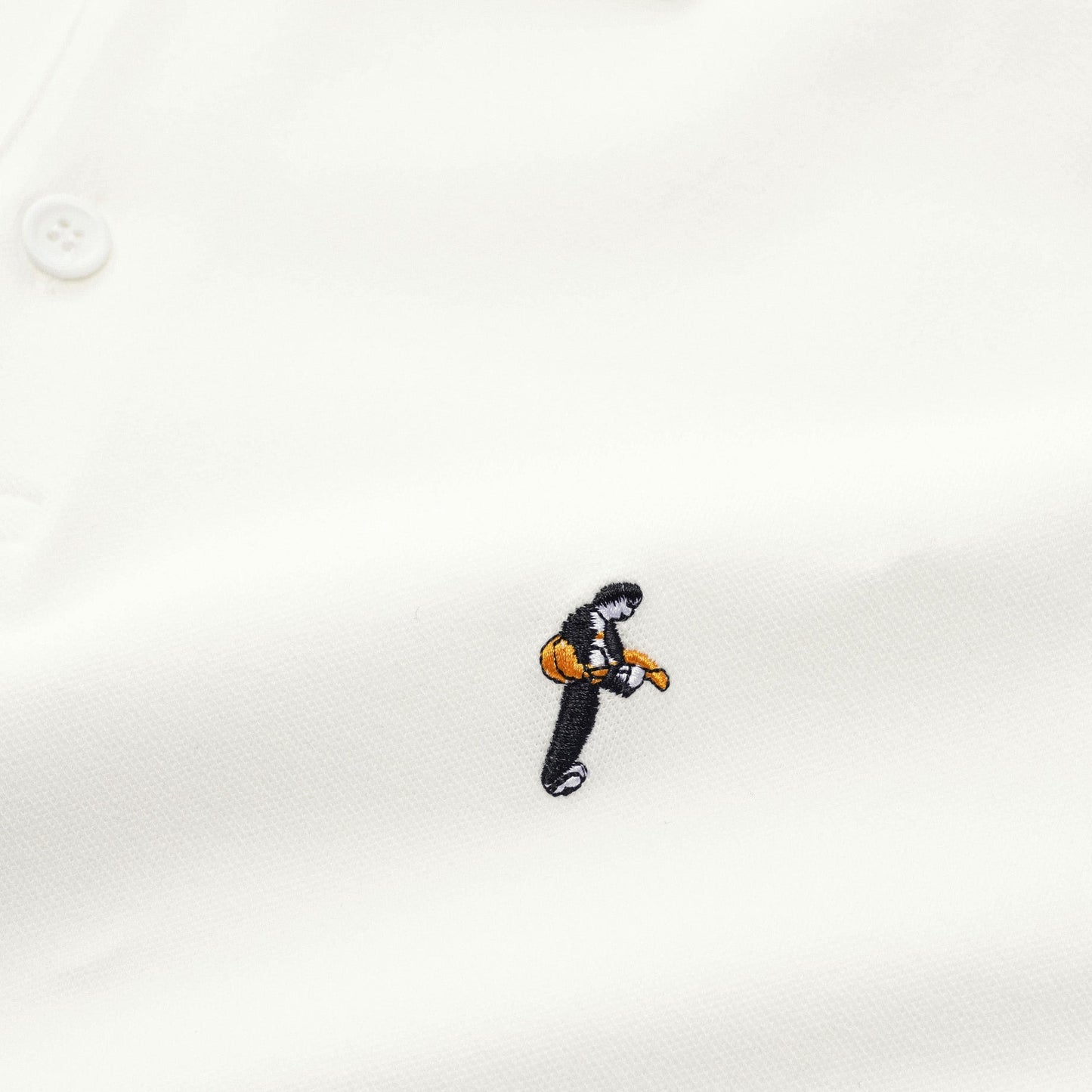 "Man playing guitar" mini embroidered pique polo shirt