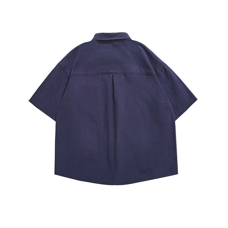 Solid color short-sleeved shirt with 3D pockets