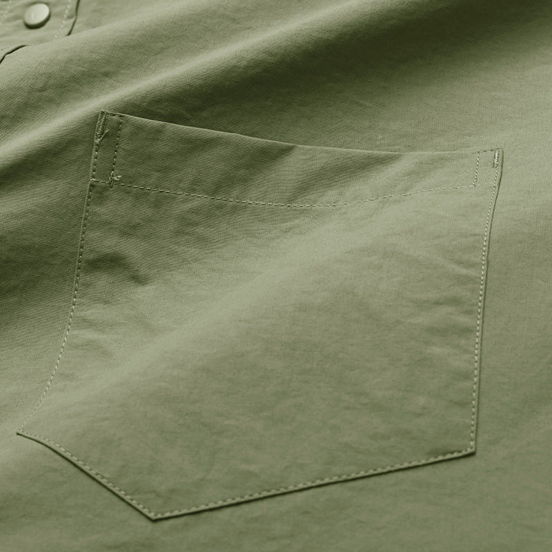 Choose from three colors of solid color irregular pocket long sleeve shirt