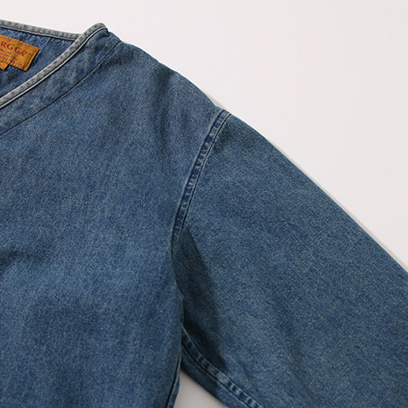 Color-coordinated button collarless denim jacket