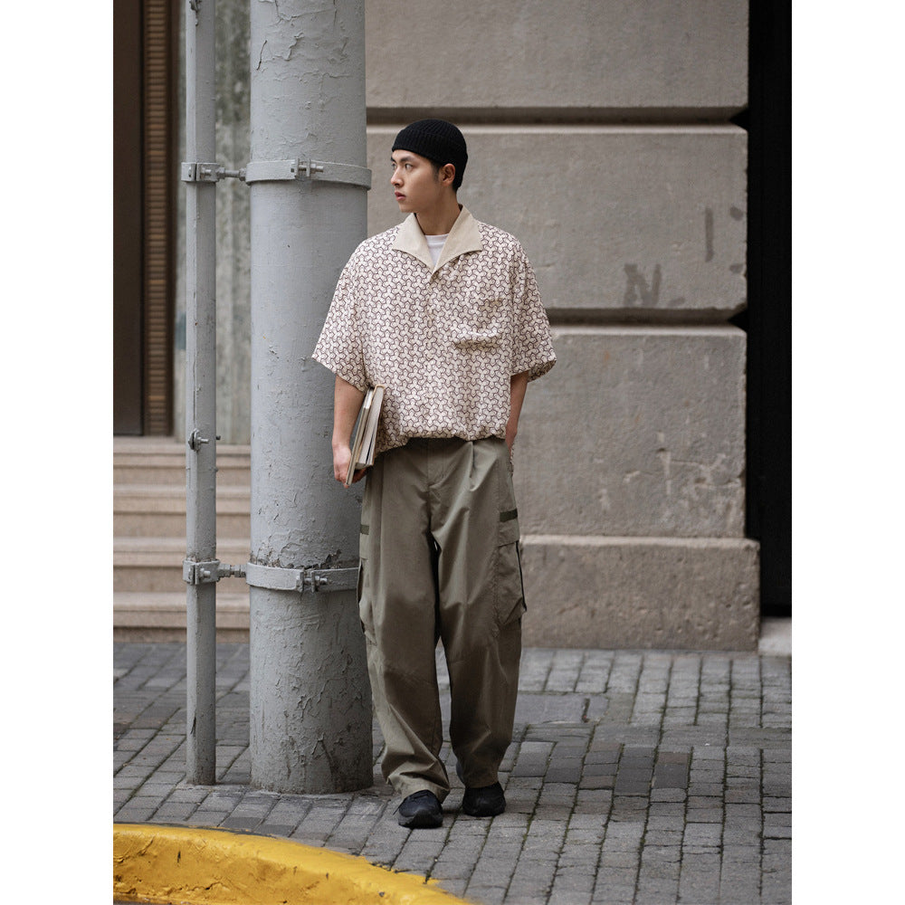 Geometric print draped short sleeve shirt