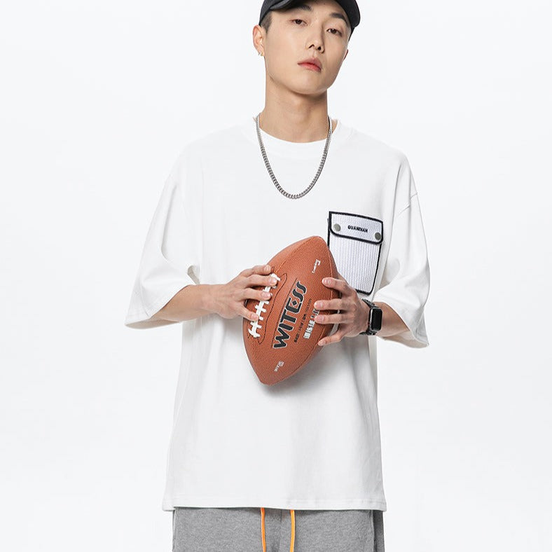 Simple short-sleeved T-shirt with color-coordinated pockets