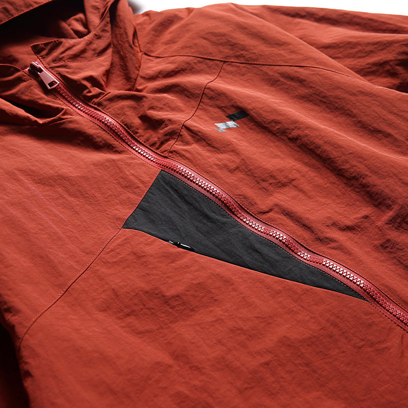 Color-coordinated irregular zipper hooded jacket