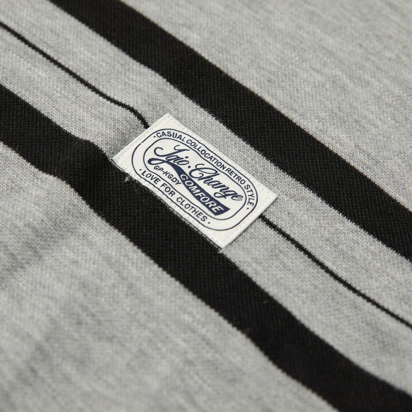 Classic gray and black striped polo shirt