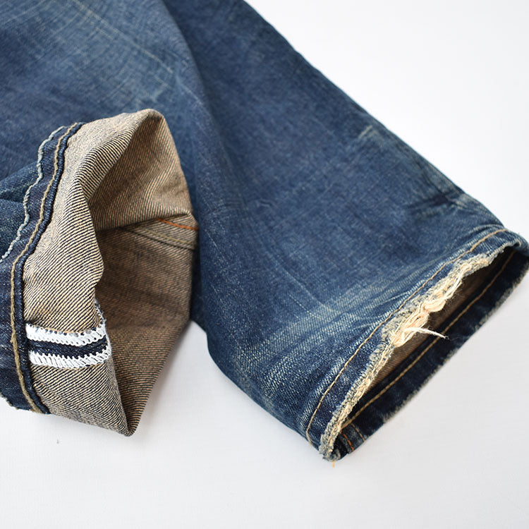 Straight denim pants with whiskered and distressed hem