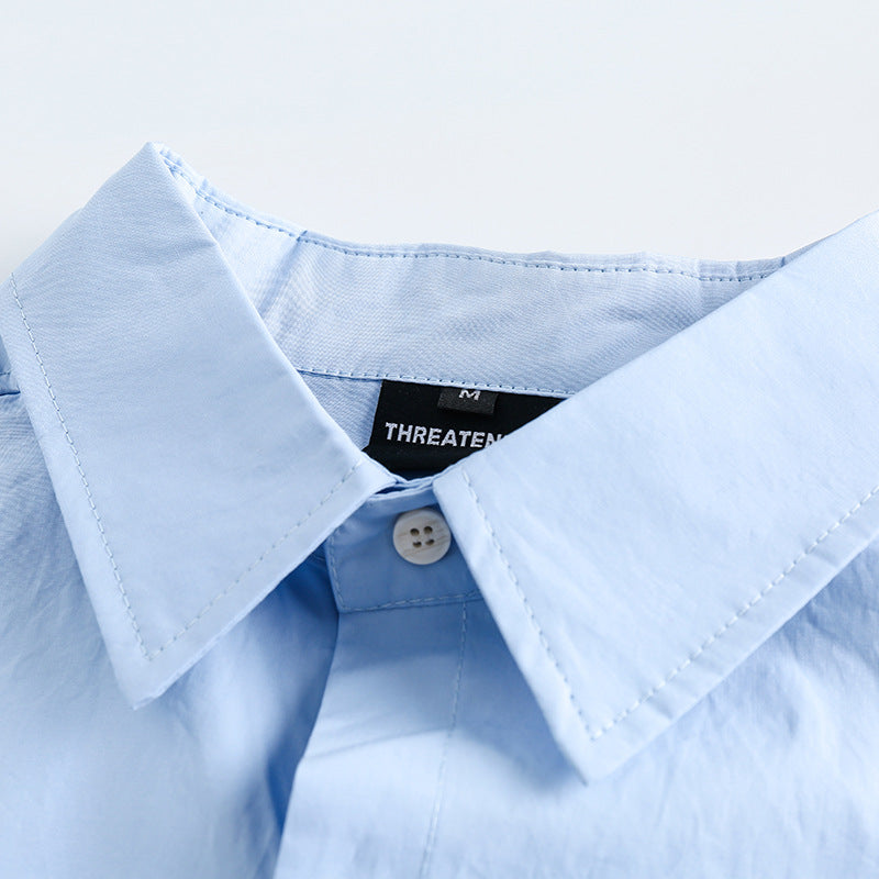 Classic plain pocket-decorated long-sleeved shirt