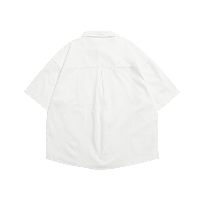Solid color short-sleeved shirt with 3D pockets