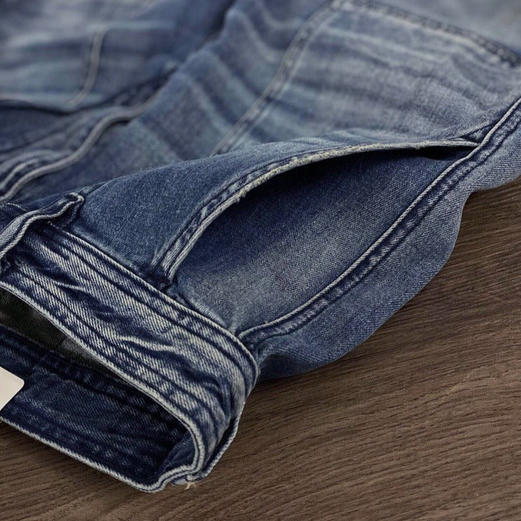 Whiskered and washed patch pocket denim pants