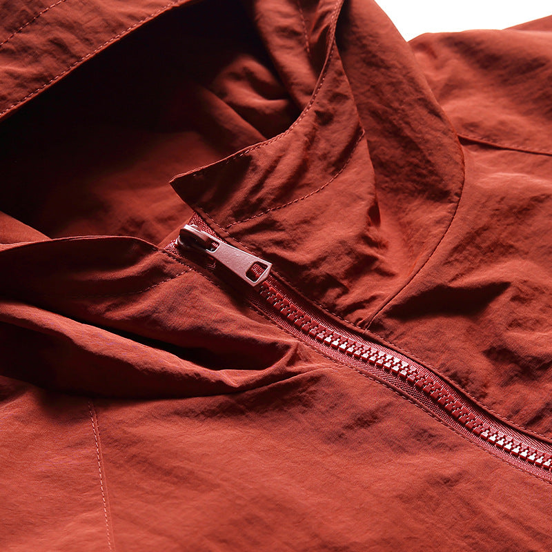 Color-coordinated irregular zipper hooded jacket