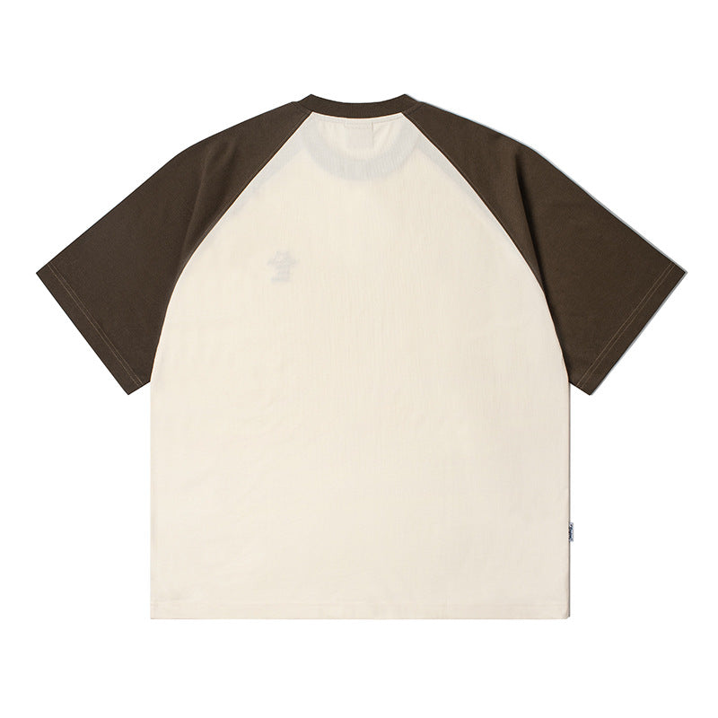 Color-coordinated embroidered raglan sleeve short-sleeved T-shirt