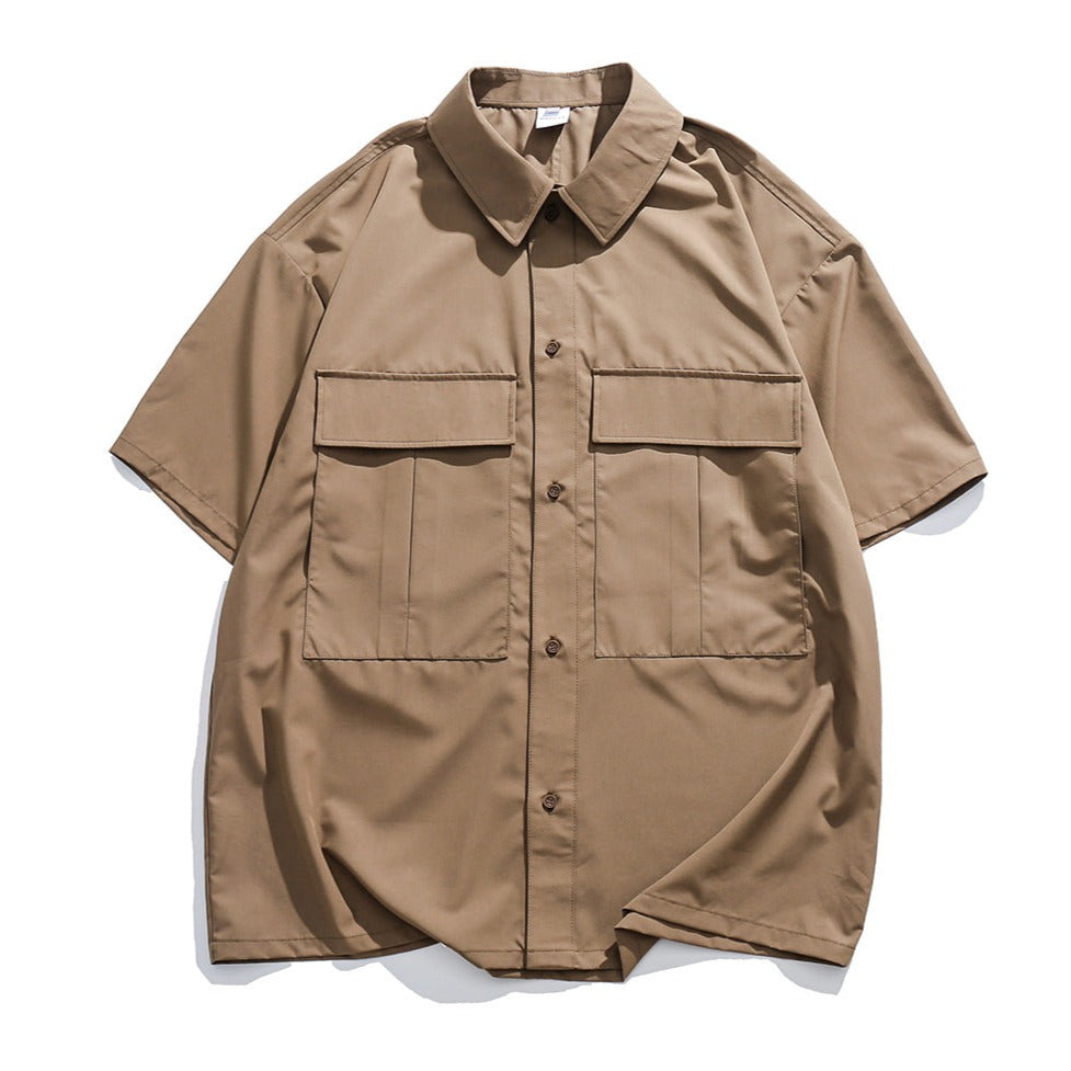 Choose from three colors. Solid color short-sleeved work shirt with pocket.