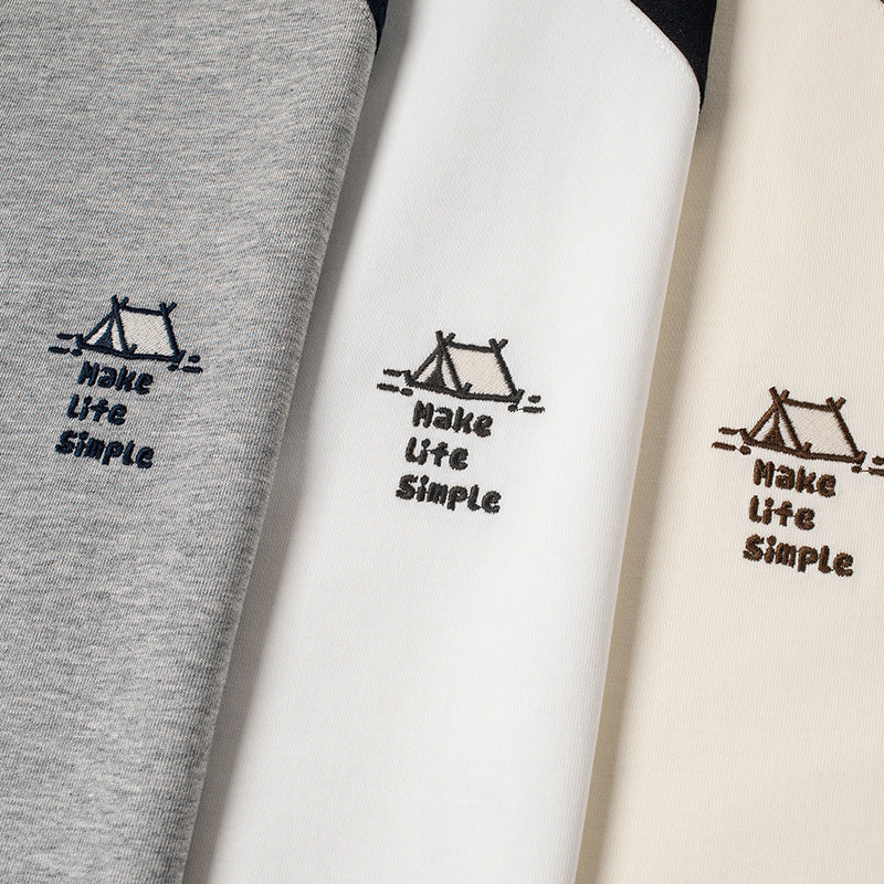 Color-coordinated embroidered raglan sleeve short-sleeved T-shirt